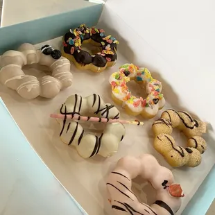 Top Row: Chocolate, Vanilla, Churro; Bottom Row: Ube, Matcha, Strawberry