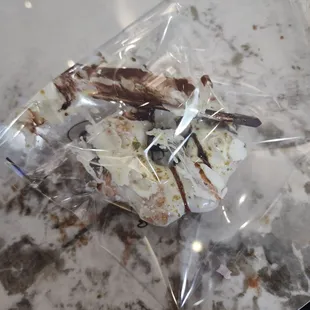 Her excuse was it was still wet, laughed and just handed it to us, instead of replacing it.