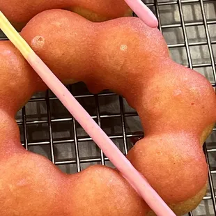 two donuts with straws