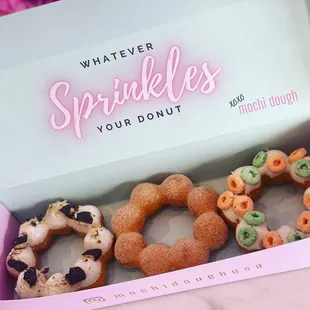 a variety of donuts in a box
