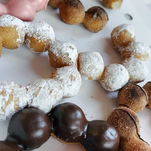 I ordered the Churro, Funnel Cake, Chocolate, &amp; Raspberry Garden Mochi Doughnuts.