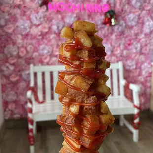 Korean corn dog - half mozzarella half hotdog, with potato topping.