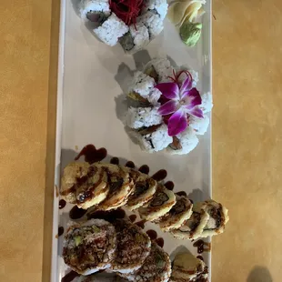 From bottom, spider roll, flying unagi, Alaskan roll and yellowtail w/ scallion roll