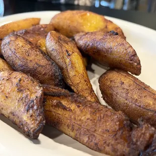 a plate of fried bananas