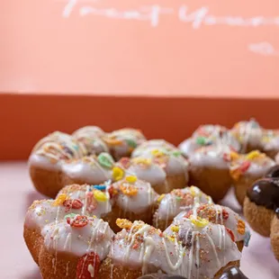 a dozen donuts in a box