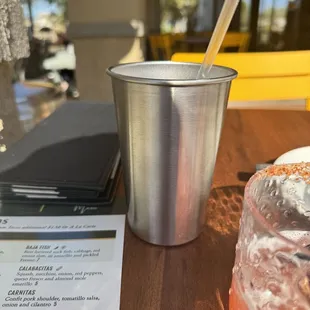 a drink and a menu