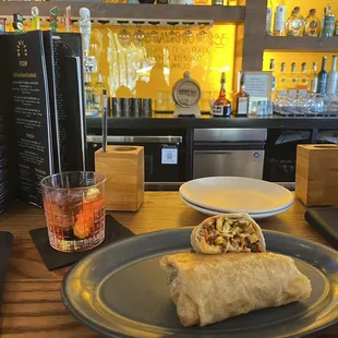 Breakfast burrito and Oaxaca old fashioned