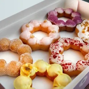 a dozen donuts in a box