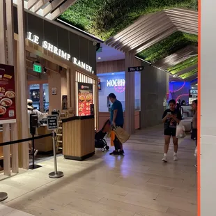 This is located below Paradise Dynasty.