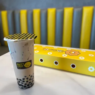 a cup of bubble tea on a table