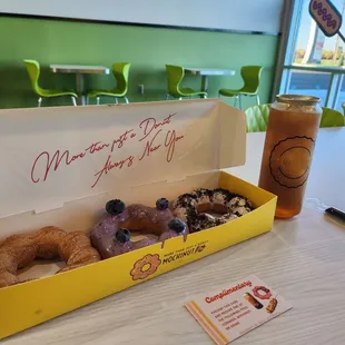 Pumpkin spice churros carmel, blueberry yogurt, cookies and cream with a passion fruit iced tea