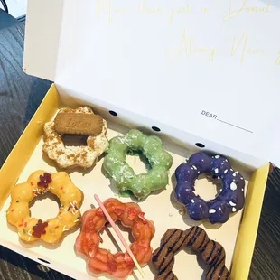 Mochi Donuts 6 for $18 ( white chocolate with biscoff, pandan, Ube, mango with gummy bear, strawberry, &amp; chocolate churros).