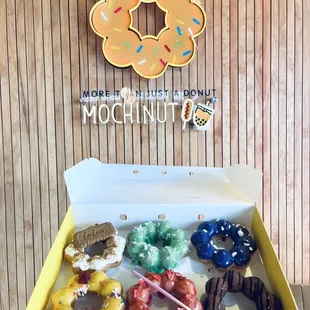 Mochi Donuts 6 for $18 ( white chocolate with biscoff, pandan, Ube, mango with gummy bear, strawberry, &amp; chocolate churros).