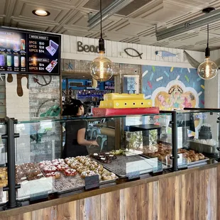 a woman behind the counter