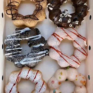From L to R: Chocolate Churro, Triple Chocolate, Cookies &amp; Cream, Strawberry Horchata, Strawberry Funnel, &amp; Milk N Cereal