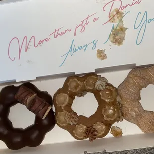 Chocolate Kinder, Tiramisu, and Chai Churro! Donuts got a little jostled around on the way home lol