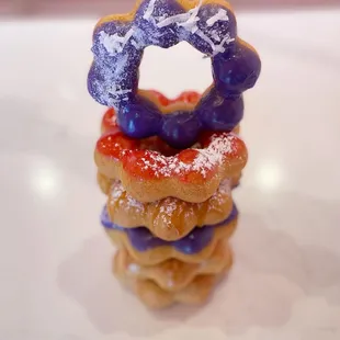 @eat_with_jeleneeee | Ube Coconut, Ube Sugar, Caramel Funnel Cake, Strawberry Mango, Churro, &amp; Glazed