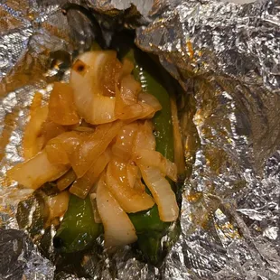 They give you grilled jalapeños and onions