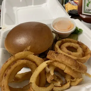 Mushroom Swiss burger with onion rings