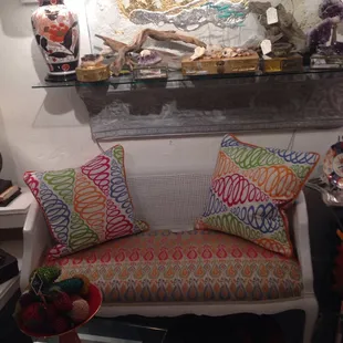 Terrific painted white antique settee with Designer Guild fabric.