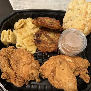 Fried Chicken with macaroni &amp; cheese, Potato Latkes, and a Buttermilk Biscuit. YUM!