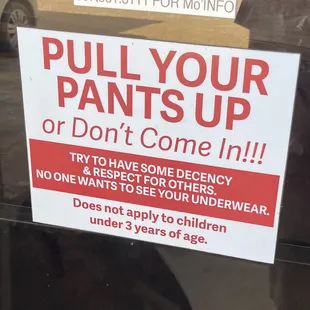 ows a sign in a store window