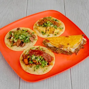 three tacos on a plate
