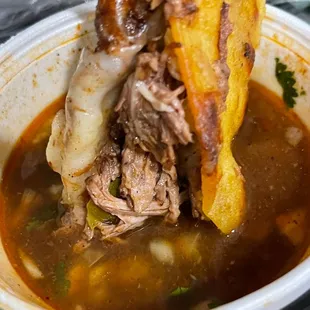 Birria taco with Consome