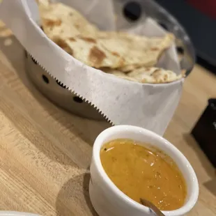 Naan and some kind of ?curry based dip?