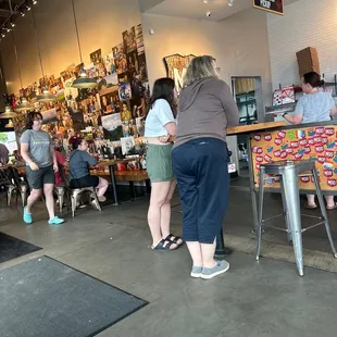 a group of people at a counter