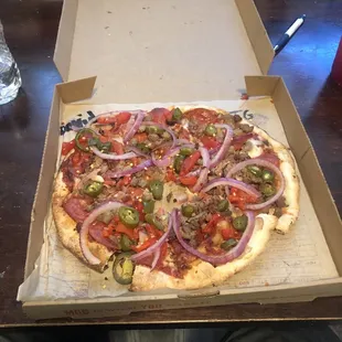 Meat lovers with red onion, roasted red peppers and jalapeños
