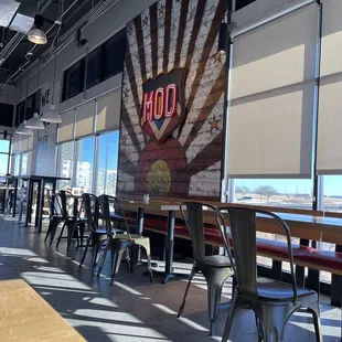 Nice seating area for a fast casual pizza place.