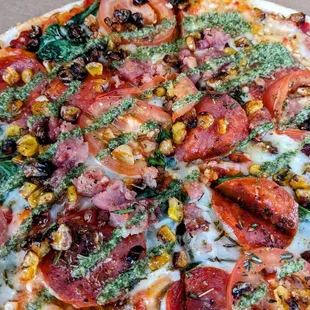 custom pizza with pesto drizzle