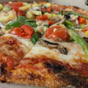 a close up of a pizza in a box