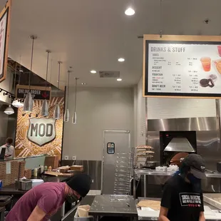 two men working in the kitchen