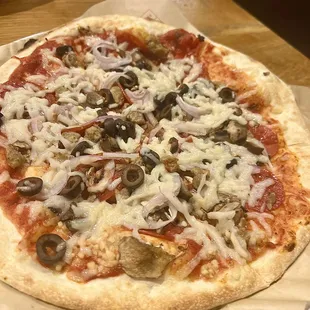 Dairy free cheese with sausage, mushroom, onion &amp; black olives.