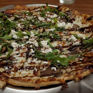 Wild mushroom pizza. Pretty good. Balsamic drizzle slightly sweet.
