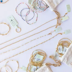 E Newton bracelets, necklaces and rings