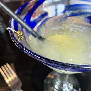 Charlie sharing a cocktail.
