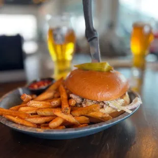 a plate of fries and a burger