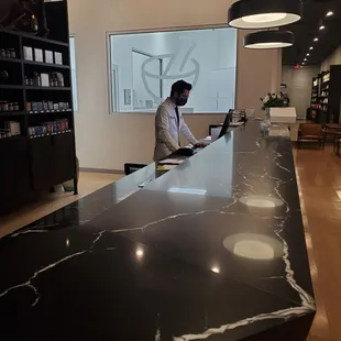 Friendly pharmacist working after hours