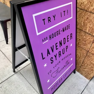 a sign for try it and house made lavender syrup