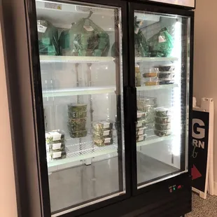 Fridge in lobby with salads for pick up