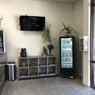 Lobby area. Fridge with to go foods.