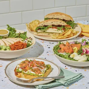a variety of sandwiches and salads