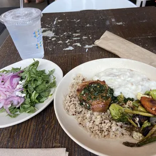 Blackened chicken thigh (boneless) served over wild rice &amp; quinoa, garlic mashed potatoes, grilled veggies &amp; an arugula salad