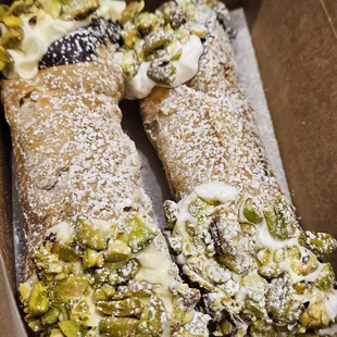 Chocolate dipped, whipped cream filling with pistachios