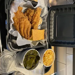 Fried catfish with macaroni and cheese and greens. Delicious