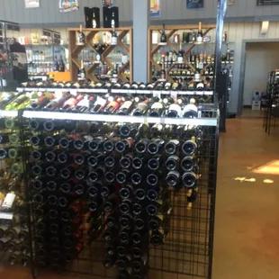 a wine rack with bottles of wine