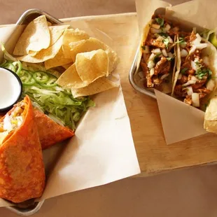 a plate of tortilla and a bowl of chips